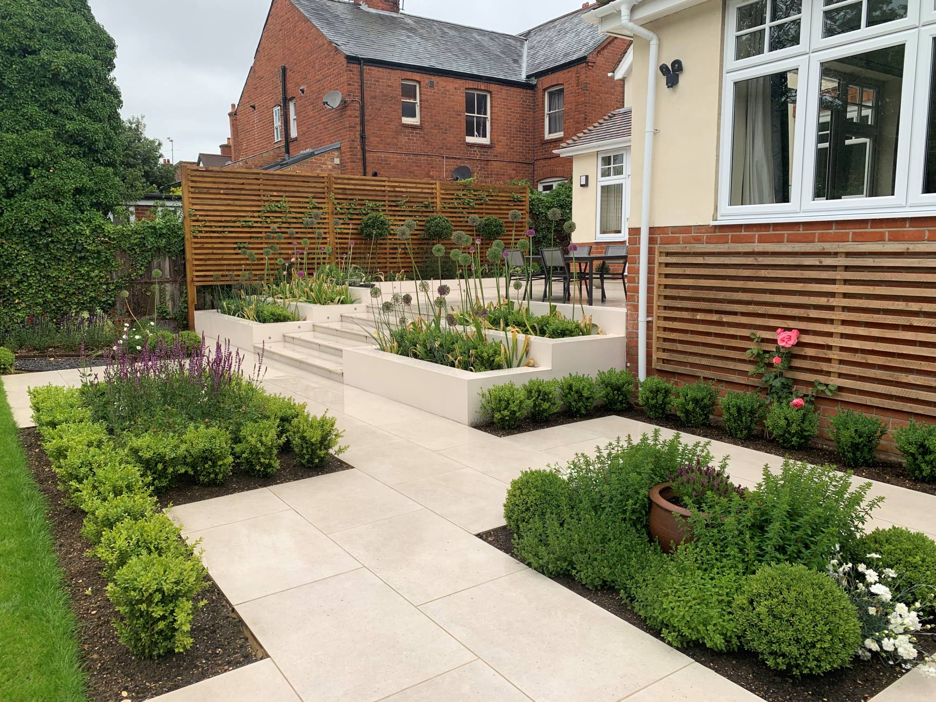 Asymmetrical Layout - Modern garden with irregular pathways